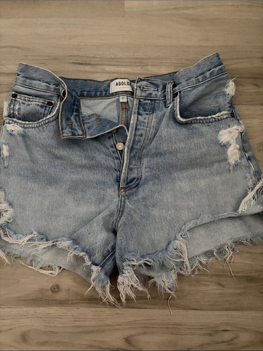 AGOLDE Washed Light Blue Distressed Denim Cutoff Shorts